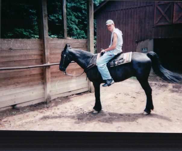 CHRISTOPHER GETTING READY TO RIDE